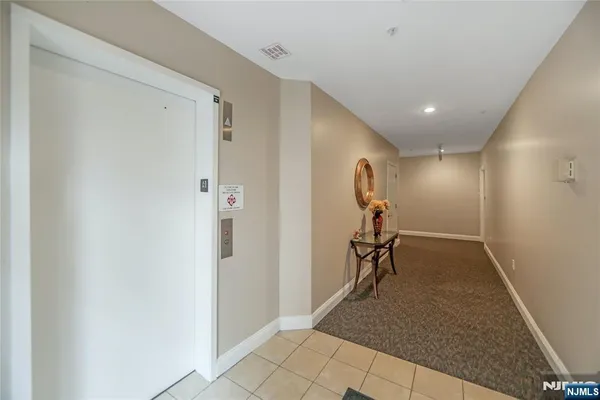 a very nice looking room with gym equipment
