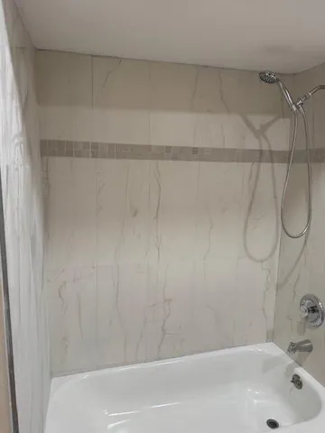 a bathroom with a toilet and a sink