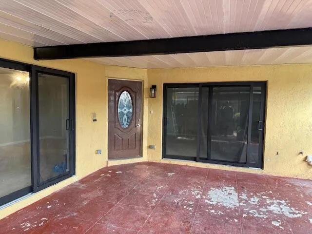 a view of a porch with a door