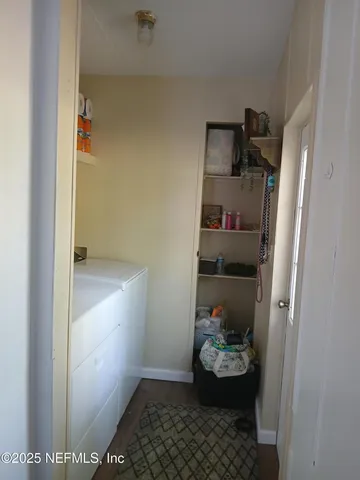 a kitchen with a sink a stove and refrigerator
