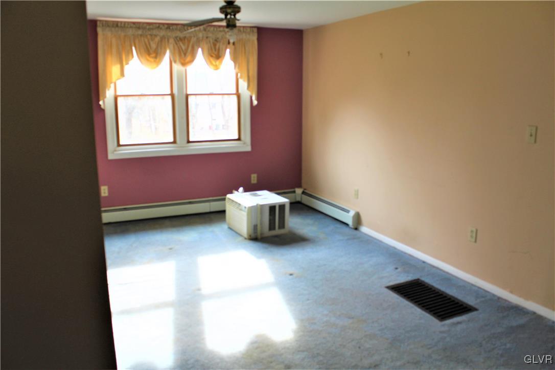 3210 Cherry Road Kunkletown, PA 18058 - Photo 4 of 12 a view of a livingroom with an empty space and a window