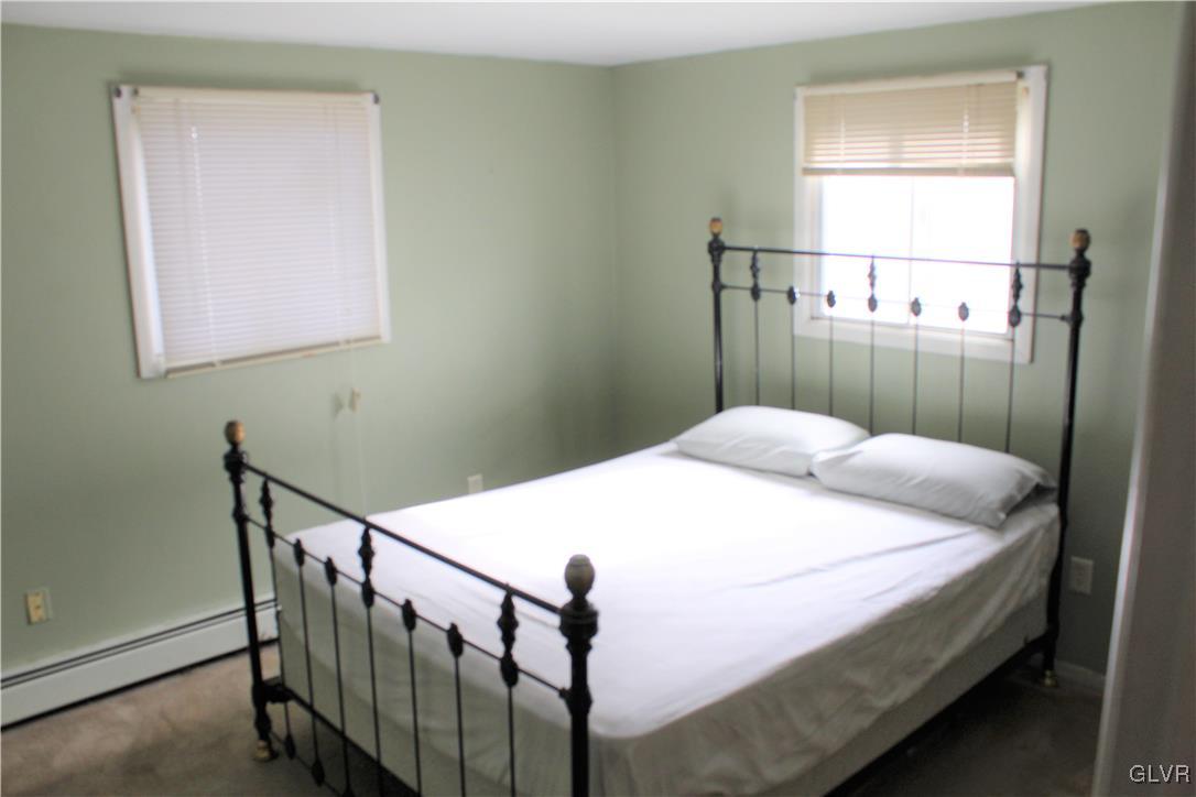 3210 Cherry Road Kunkletown, PA 18058 - Photo 5 of 12 a bedroom with a bed and a window