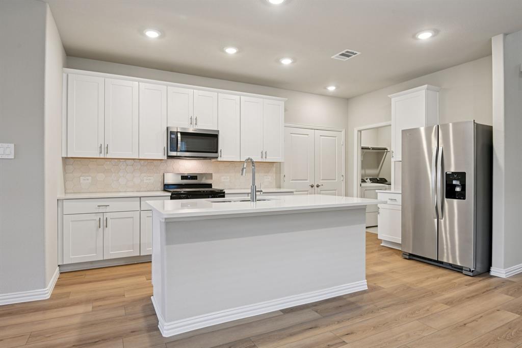 1612 Arches Road Anna, TX 75409 - Photo 2 of 37 Photo is not of the actual home, but is an inspirational photo of builder’s model home and may depict options, furnishings, and/or decorator features that are not included.