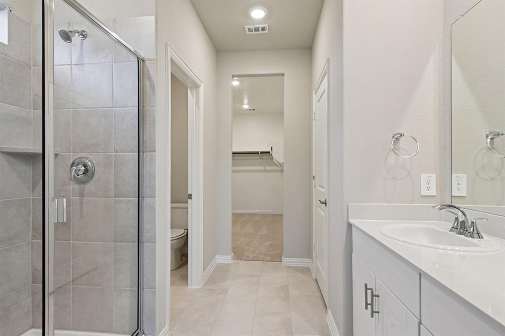 1612 Arches Road Anna, TX 75409 - Photo 21 of 37 Photo is not of the actual home, but is an inspirational photo of builder’s model home and may depict options, furnishings, and/or decorator features that are not included.