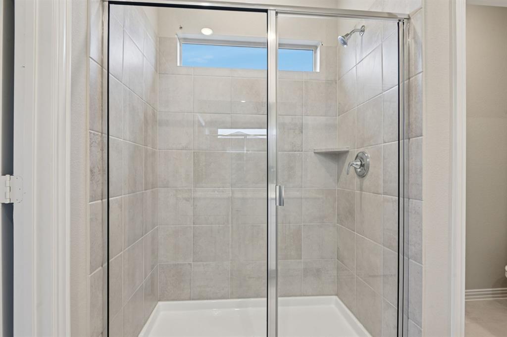 1612 Arches Road Anna, TX 75409 - Photo 23 of 37 Photo is not of the actual home, but is an inspirational photo of builder’s model home and may depict options, furnishings, and/or decorator features that are not included.