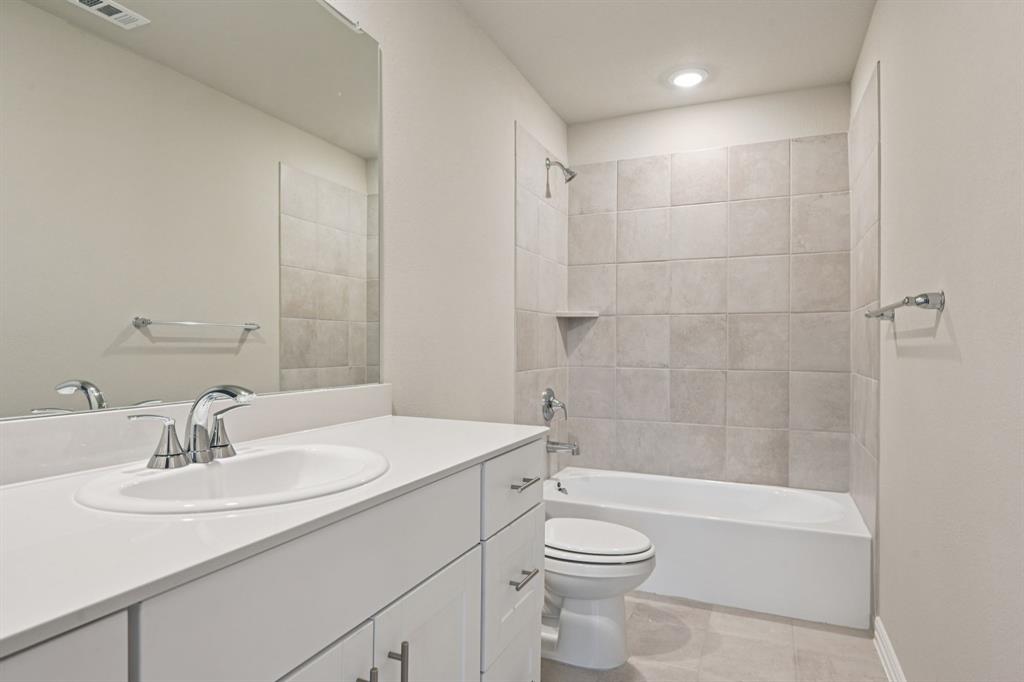 1612 Arches Road Anna, TX 75409 - Photo 31 of 37 Photo is not of the actual home, but is an inspirational photo of builder’s model home and may depict options, furnishings, and/or decorator features that are not included.