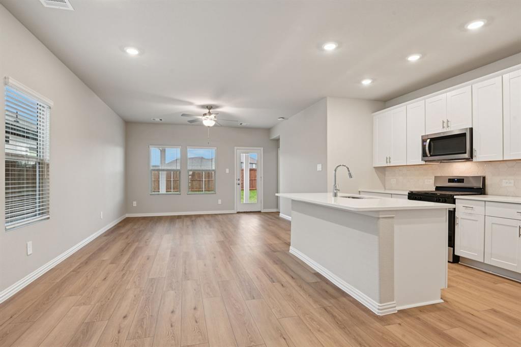 1612 Arches Road Anna, TX 75409 - Photo 5 of 37 Photo is not of the actual home, but is an inspirational photo of builder’s model home and may depict options, furnishings, and/or decorator features that are not included.