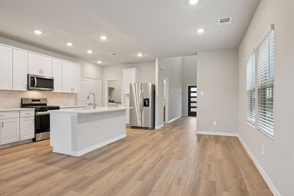 1612 Arches Road Anna, TX 75409 - Photo 7 of 37 Photo is not of the actual home, but is an inspirational photo of builder’s model home and may depict options, furnishings, and/or decorator features that are not included.