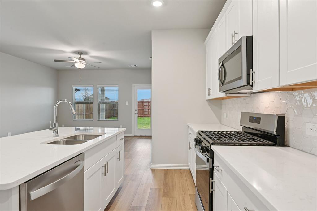 1612 Arches Road Anna, TX 75409 - Photo 8 of 37 Photo is not of the actual home, but is an inspirational photo of builder’s model home and may depict options, furnishings, and/or decorator features that are not included.