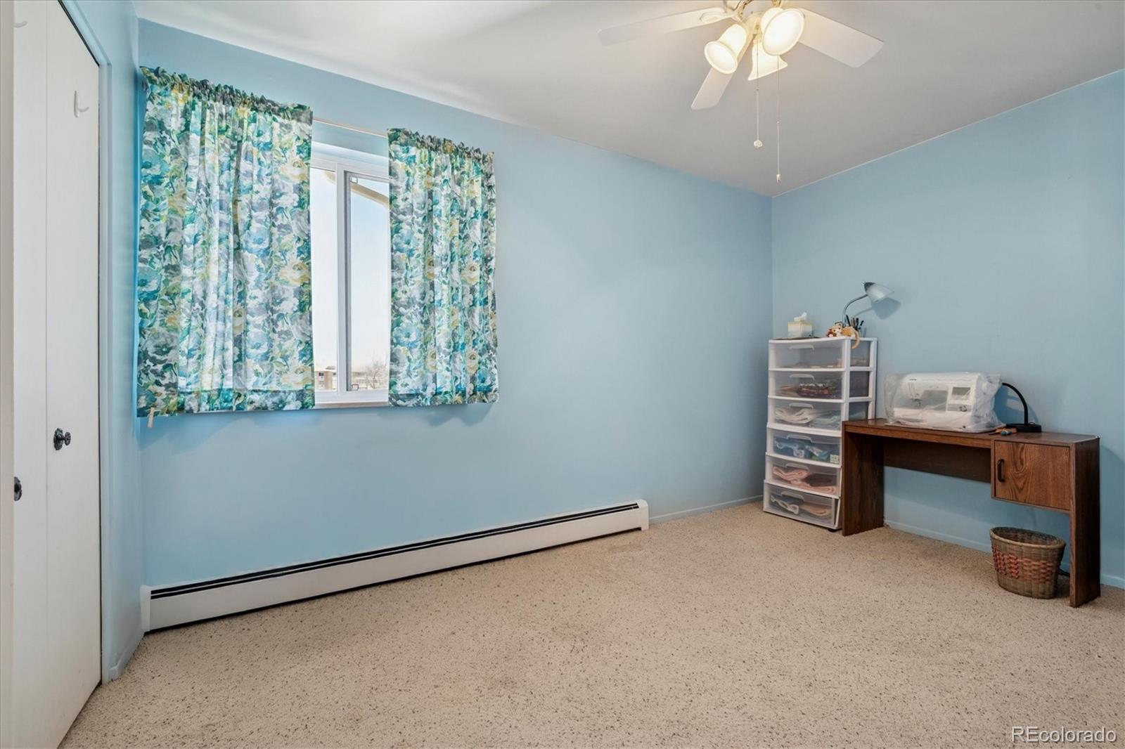 660 South Alton Way, Unit 2D Denver, CO 80247 - Photo 13 of 32 a room with a window