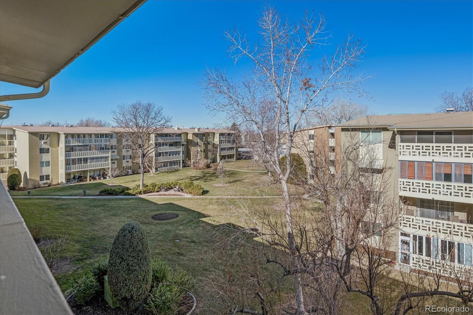 660 South Alton Way, Unit 2D Denver, CO 80247 - Photo 18 of 32 a view of building with outdoor space