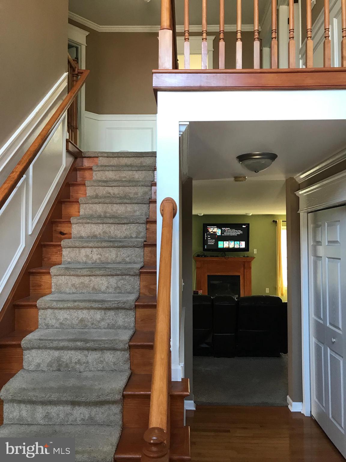 1328 Clyde Road Warminster, PA 18974 - Photo 3 of 22 stairwell with wainscoting at entrance