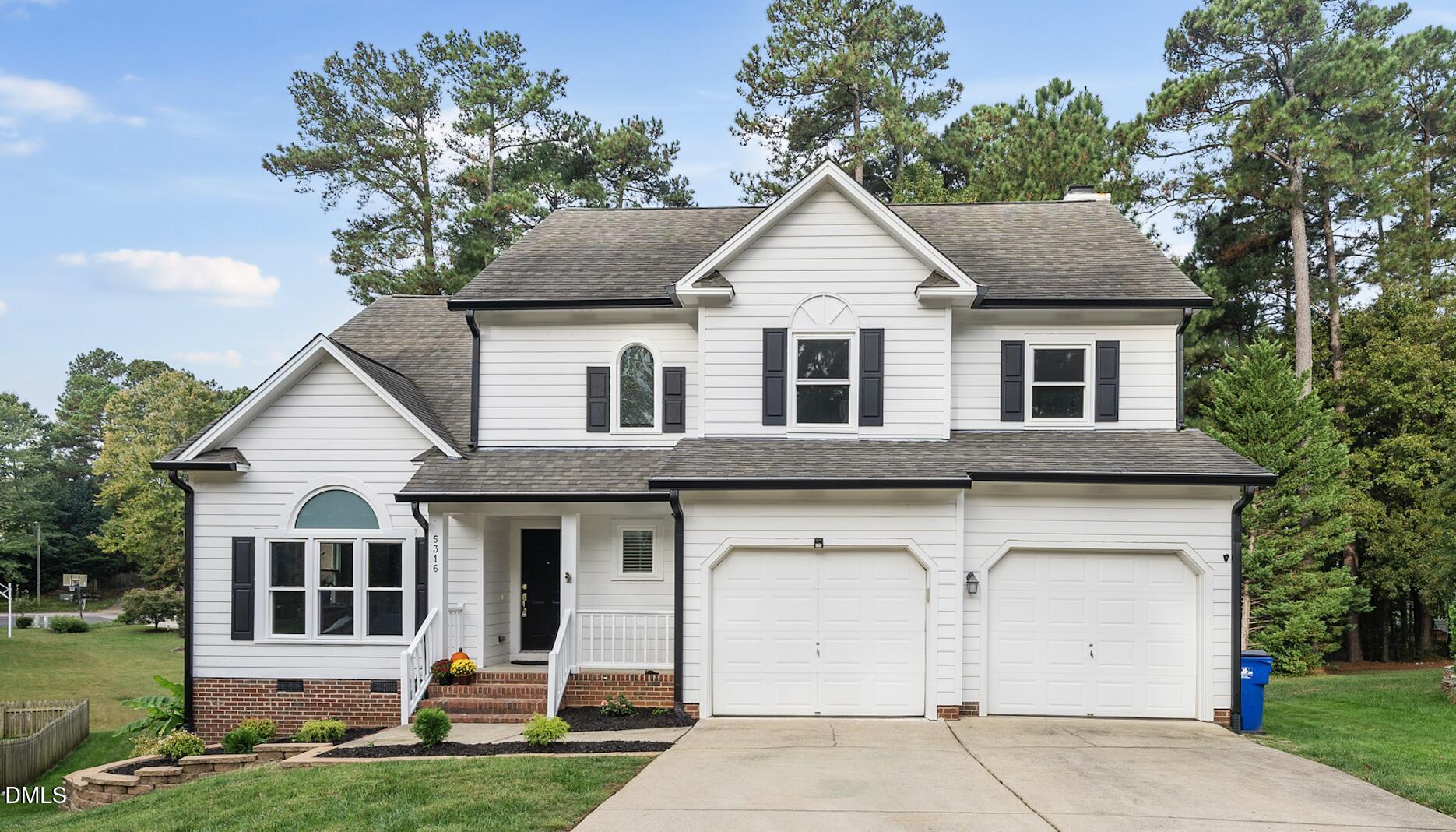 5316 Easthorpe Drive Raleigh, NC 27613 - Photo 1 of 53 a view of a yard in front of house