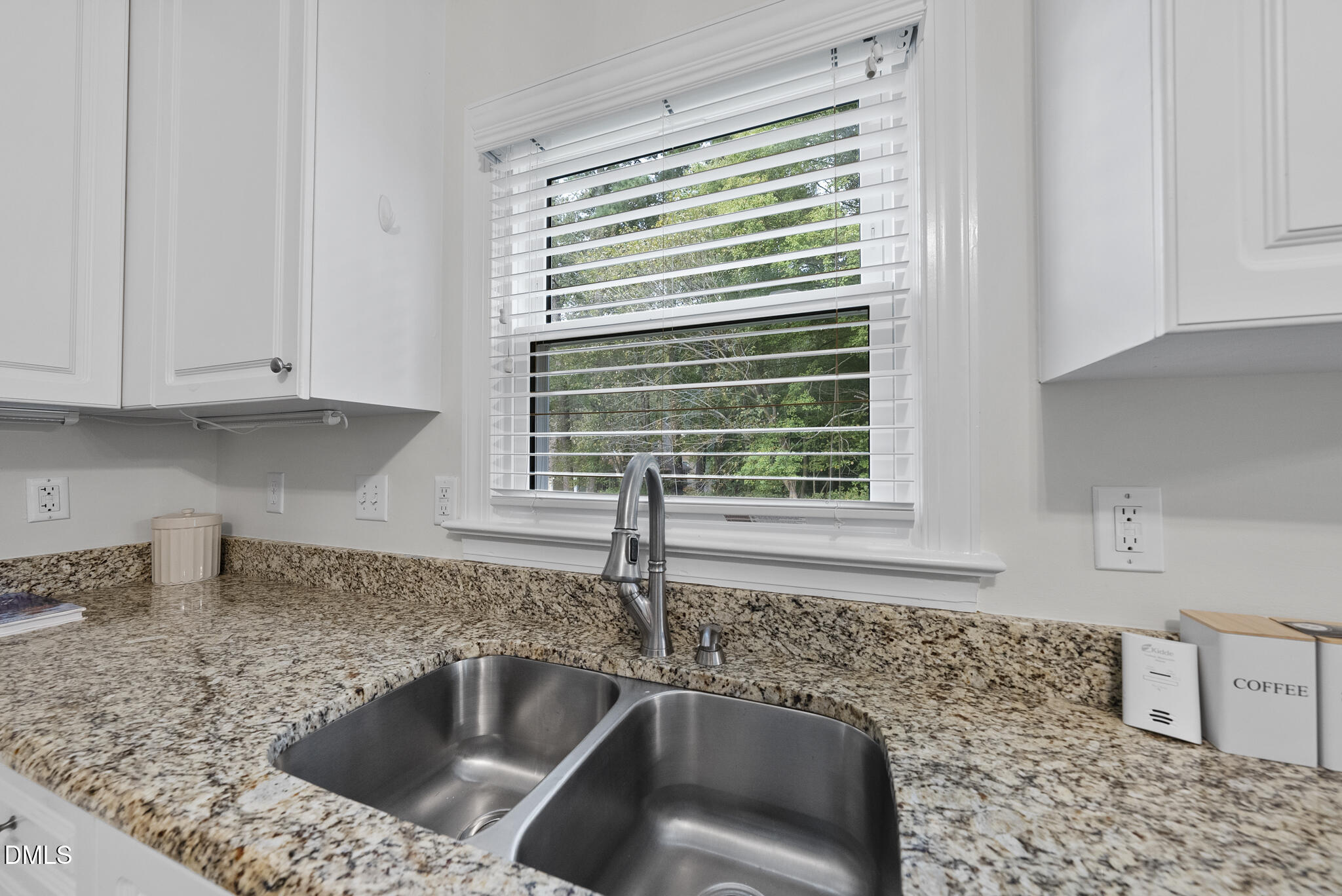 5316 Easthorpe Drive Raleigh, NC 27613 - Photo 12 of 53 a kitchen with a sink and a window