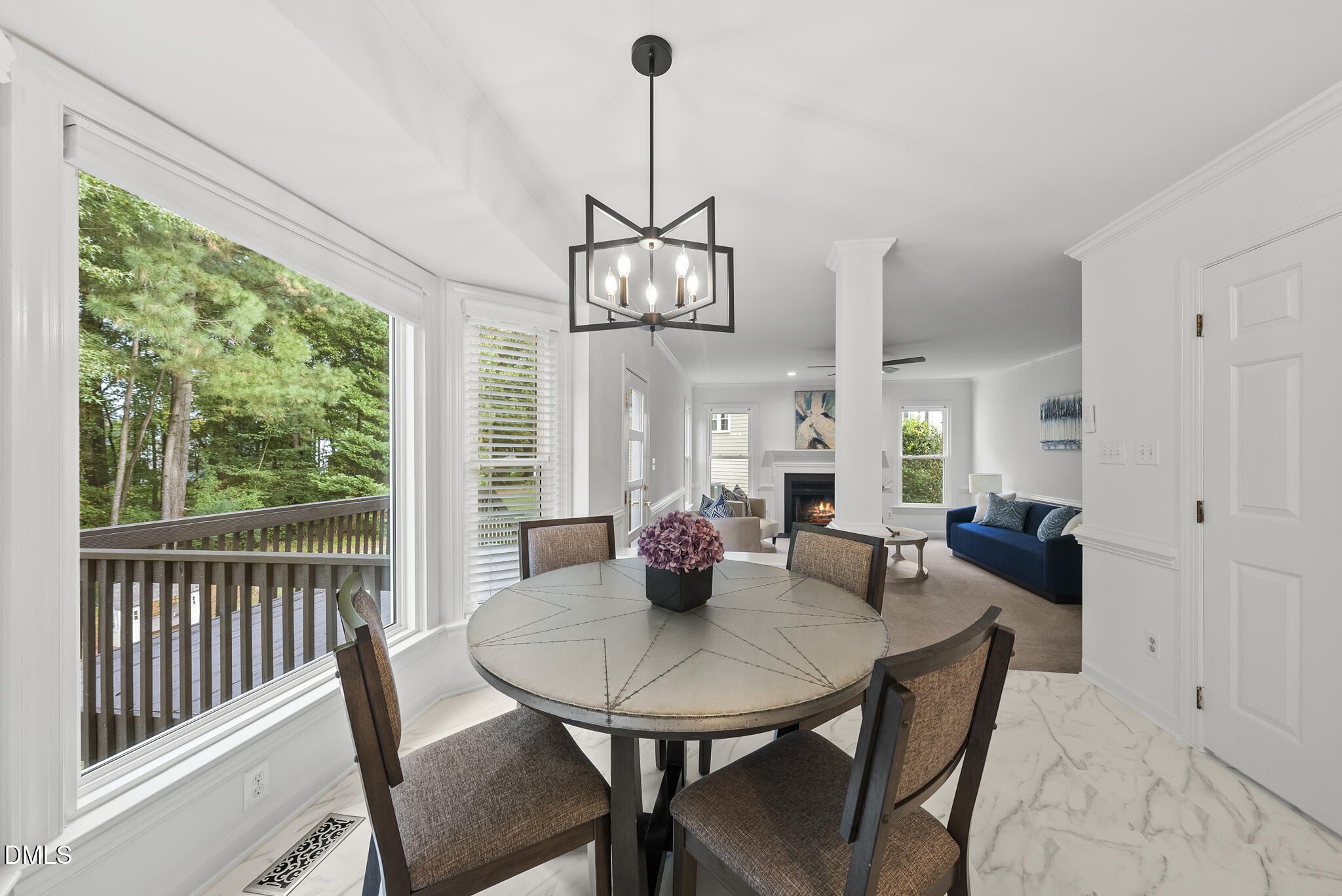 5316 Easthorpe Drive Raleigh, NC 27613 - Photo 14 of 53 a view of a dining room with furniture window and outside view