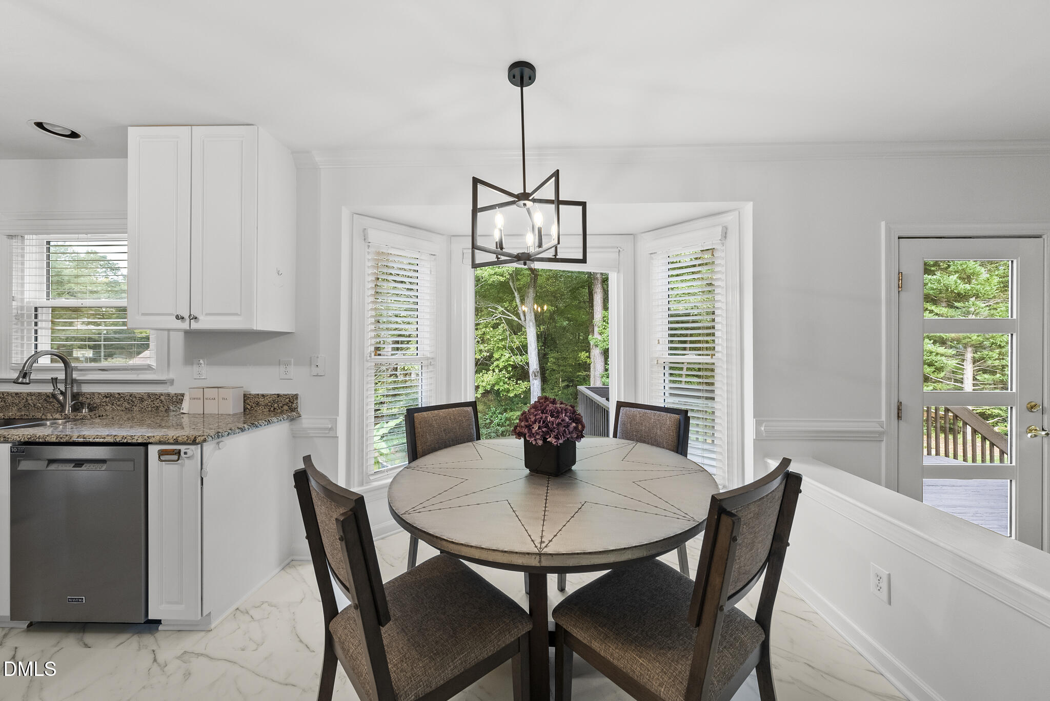 5316 Easthorpe Drive Raleigh, NC 27613 - Photo 15 of 53 a view of a dining room with furniture window and outside view