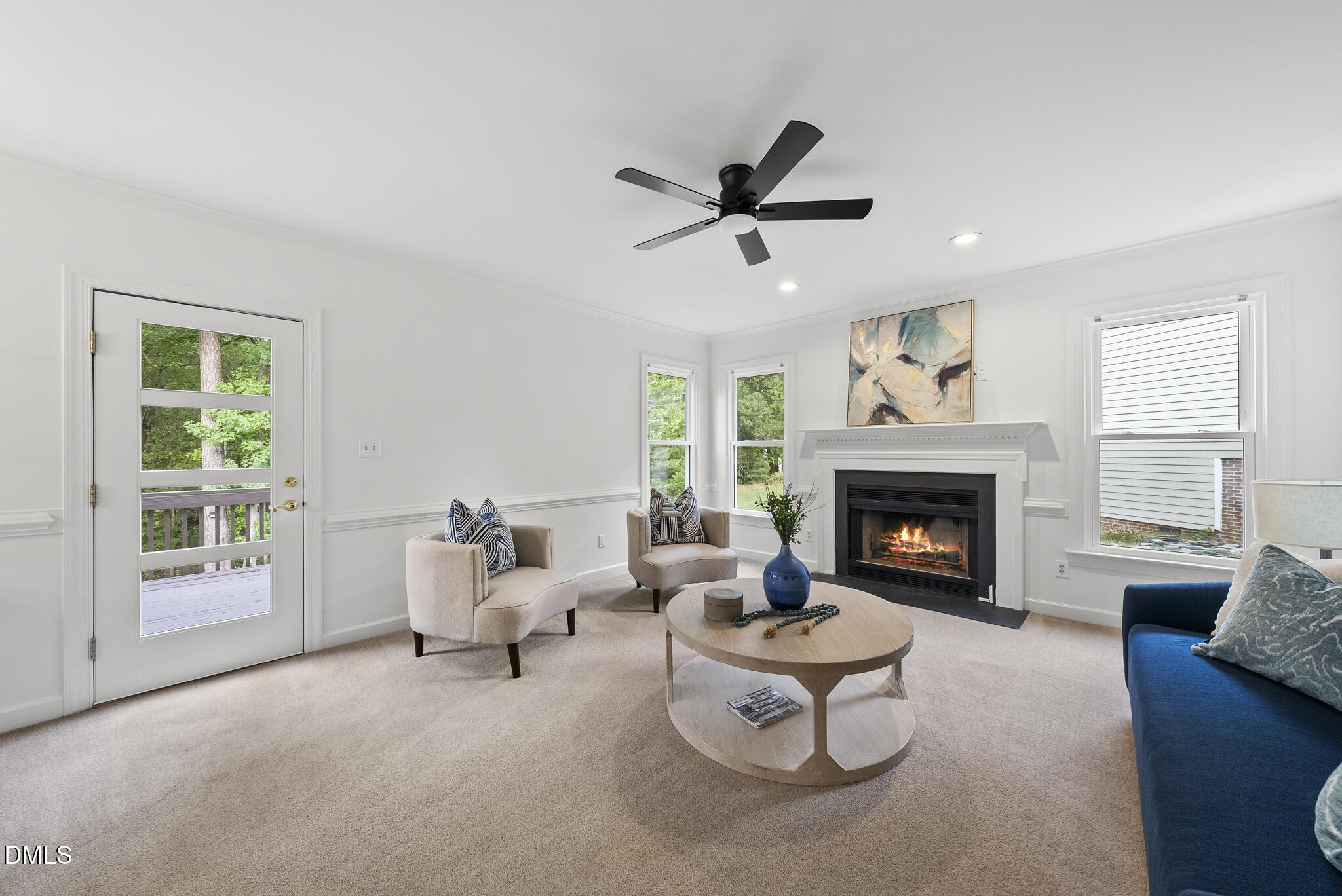 5316 Easthorpe Drive Raleigh, NC 27613 - Photo 17 of 53 a living room with furniture and a fireplace