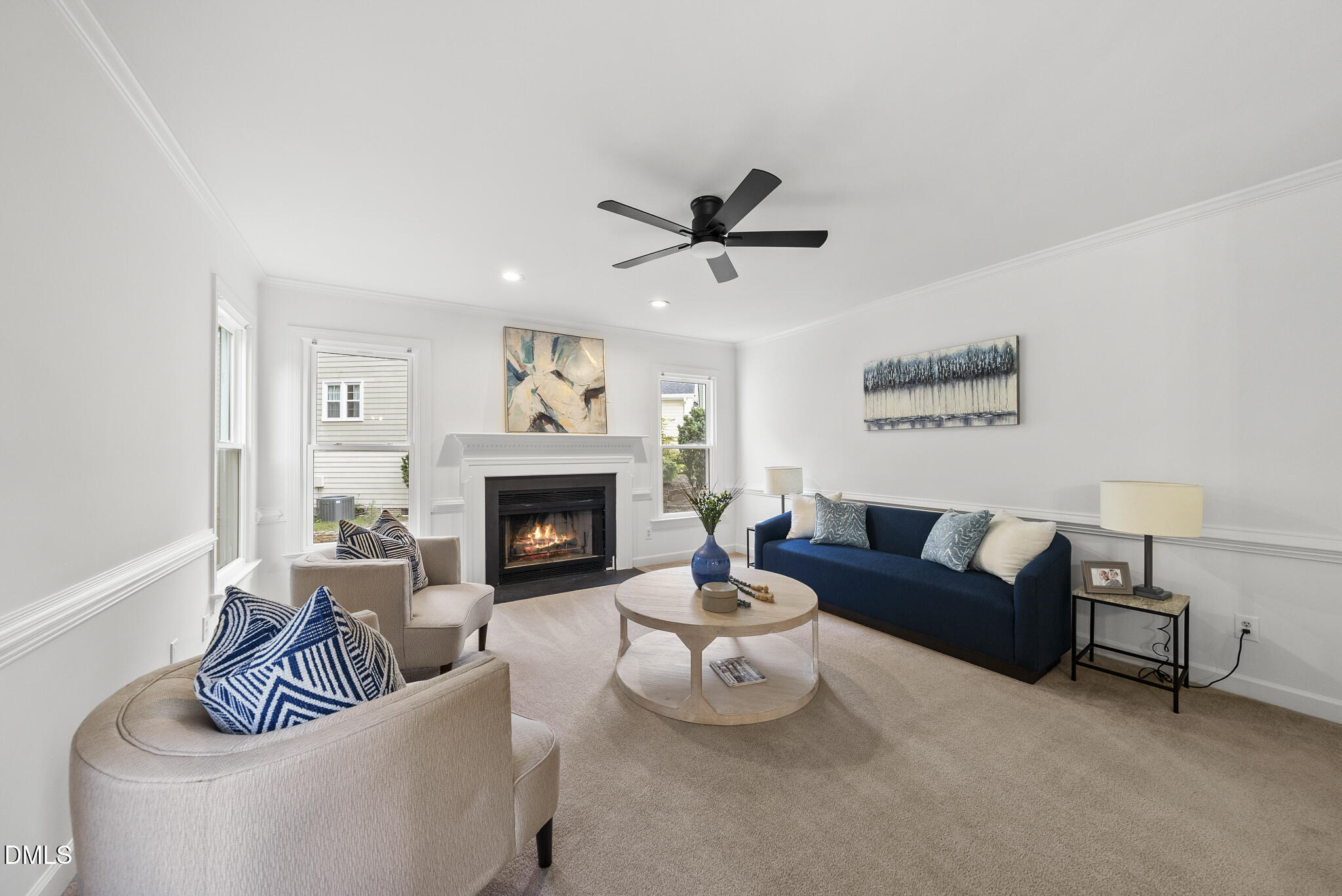 5316 Easthorpe Drive Raleigh, NC 27613 - Photo 18 of 53 a living room with furniture and a fireplace