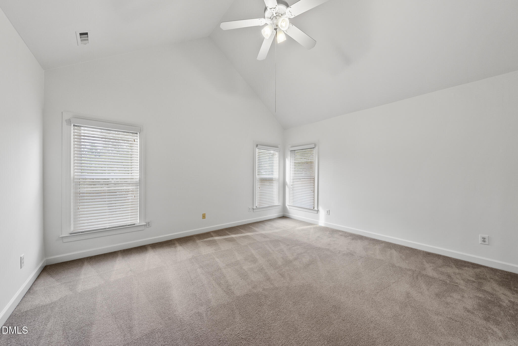 5316 Easthorpe Drive Raleigh, NC 27613 - Photo 22 of 53 an empty room with windows and fan