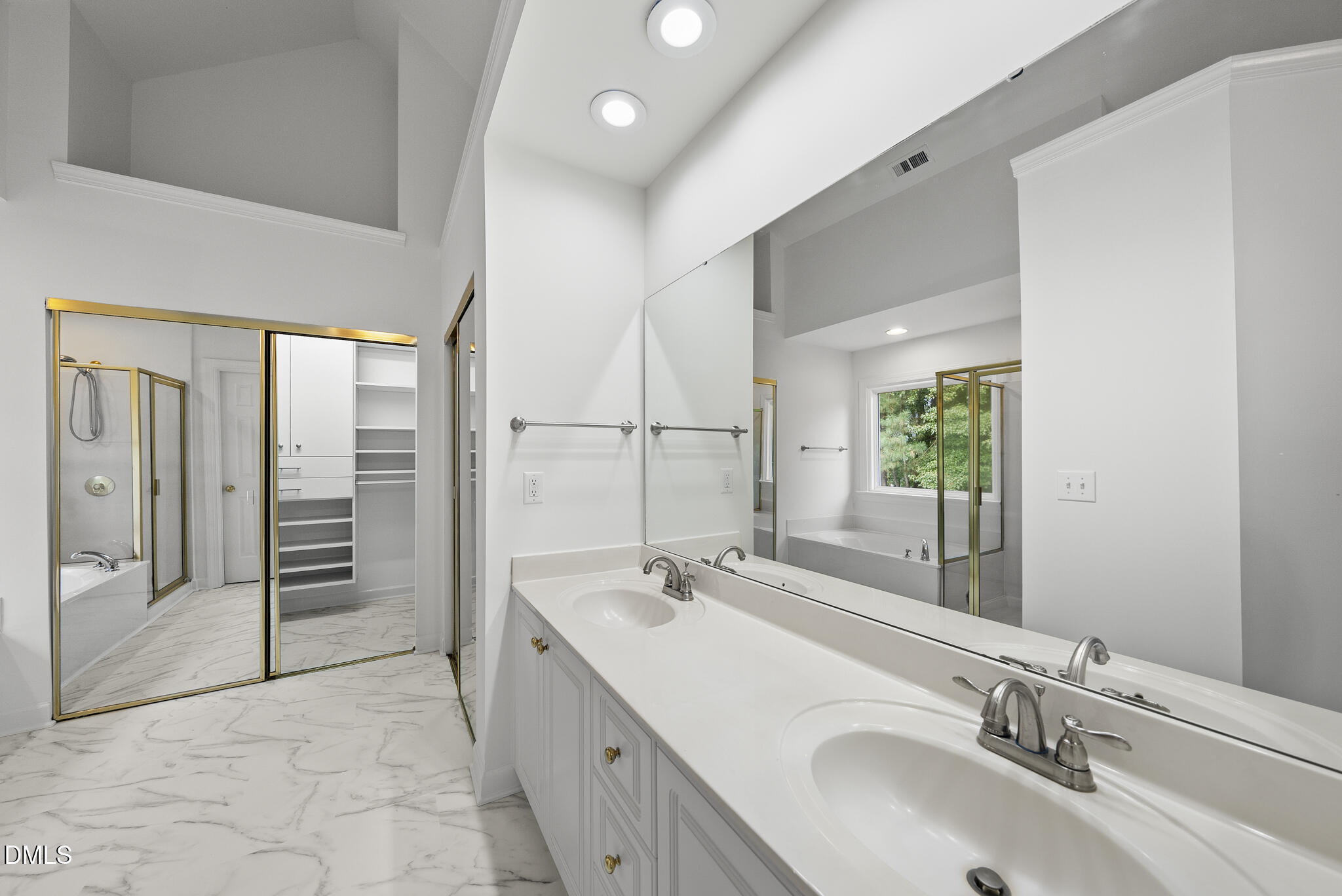 5316 Easthorpe Drive Raleigh, NC 27613 - Photo 24 of 53 a spacious bathroom with a double vanity sink mirror and double