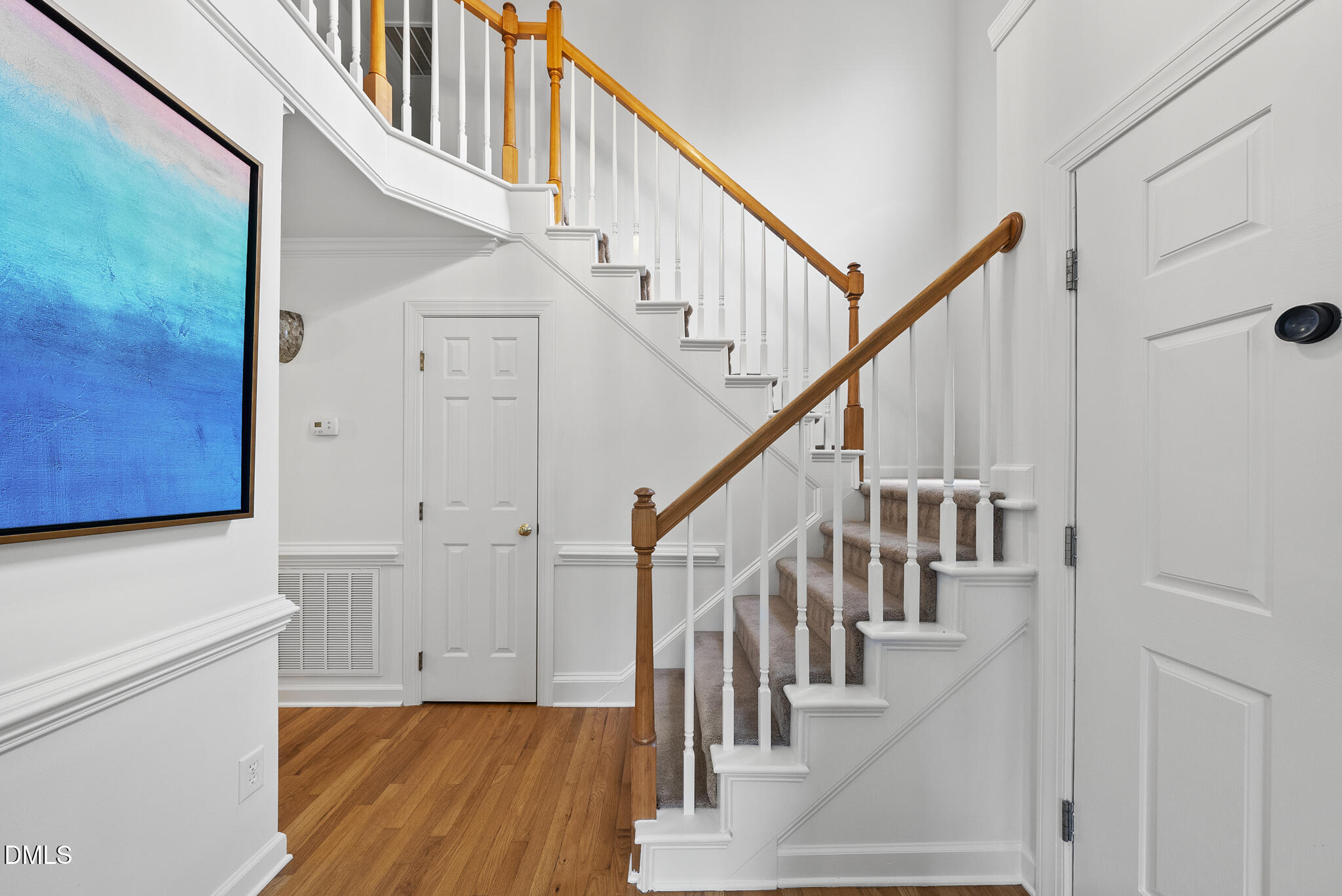 5316 Easthorpe Drive Raleigh, NC 27613 - Photo 2 of 53 a view of entryway and hall with wooden floor
