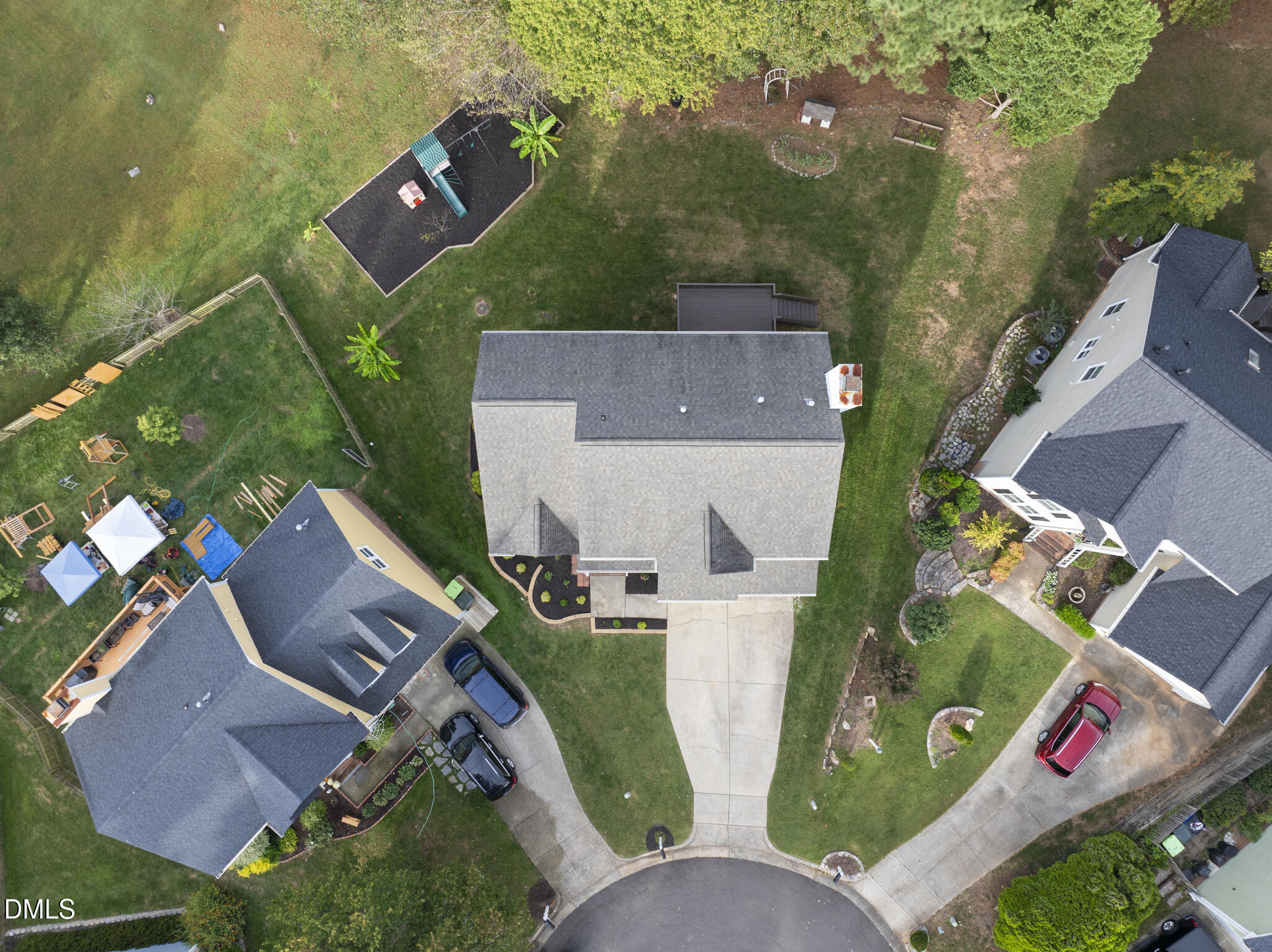 5316 Easthorpe Drive Raleigh, NC 27613 - Photo 47 of 53 an aerial view of multiple houses with yard
