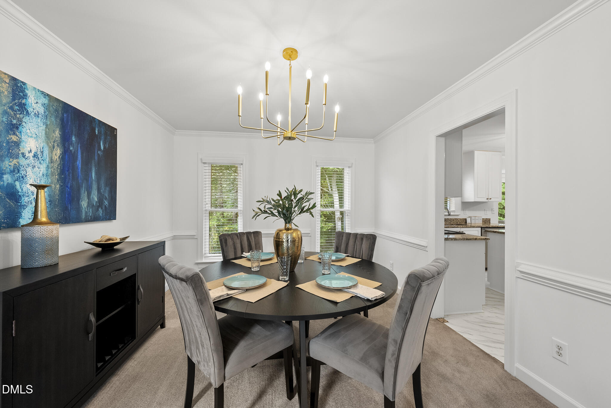 5316 Easthorpe Drive Raleigh, NC 27613 - Photo 7 of 53 a view of a dining room with furniture and chandelier