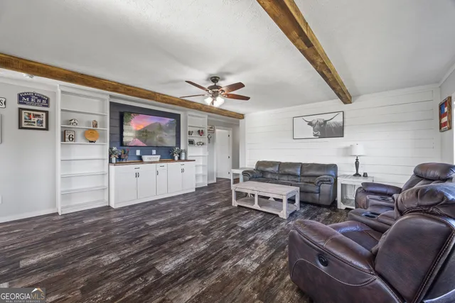 a kitchen with stainless steel appliances granite countertop a sink and cabinets