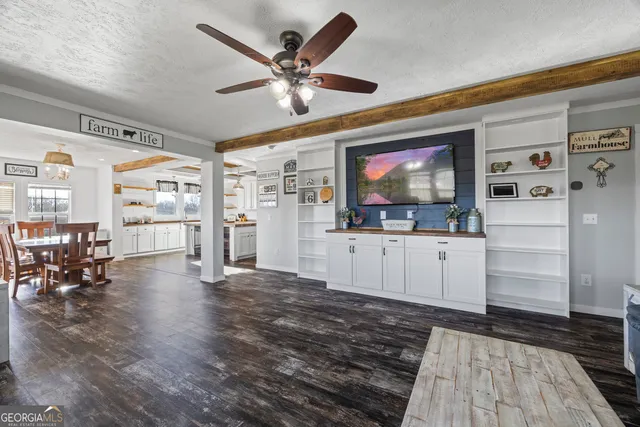 a bathroom with a sink toilet and mirror