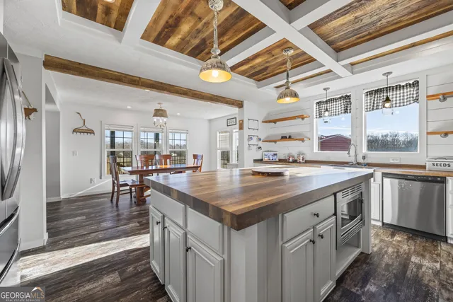 a view of a swimming pool with an ocean view