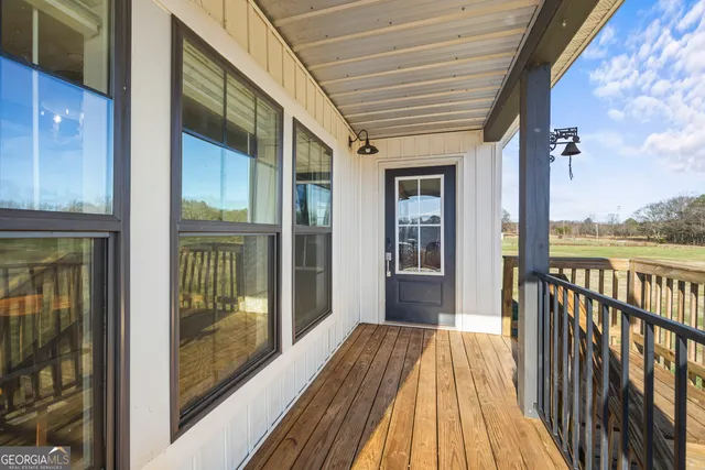 a kitchen with stainless steel appliances granite countertop a sink a stove and cabinets