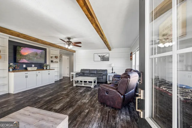 a kitchen with stainless steel appliances granite countertop a sink a stove and dishwasher