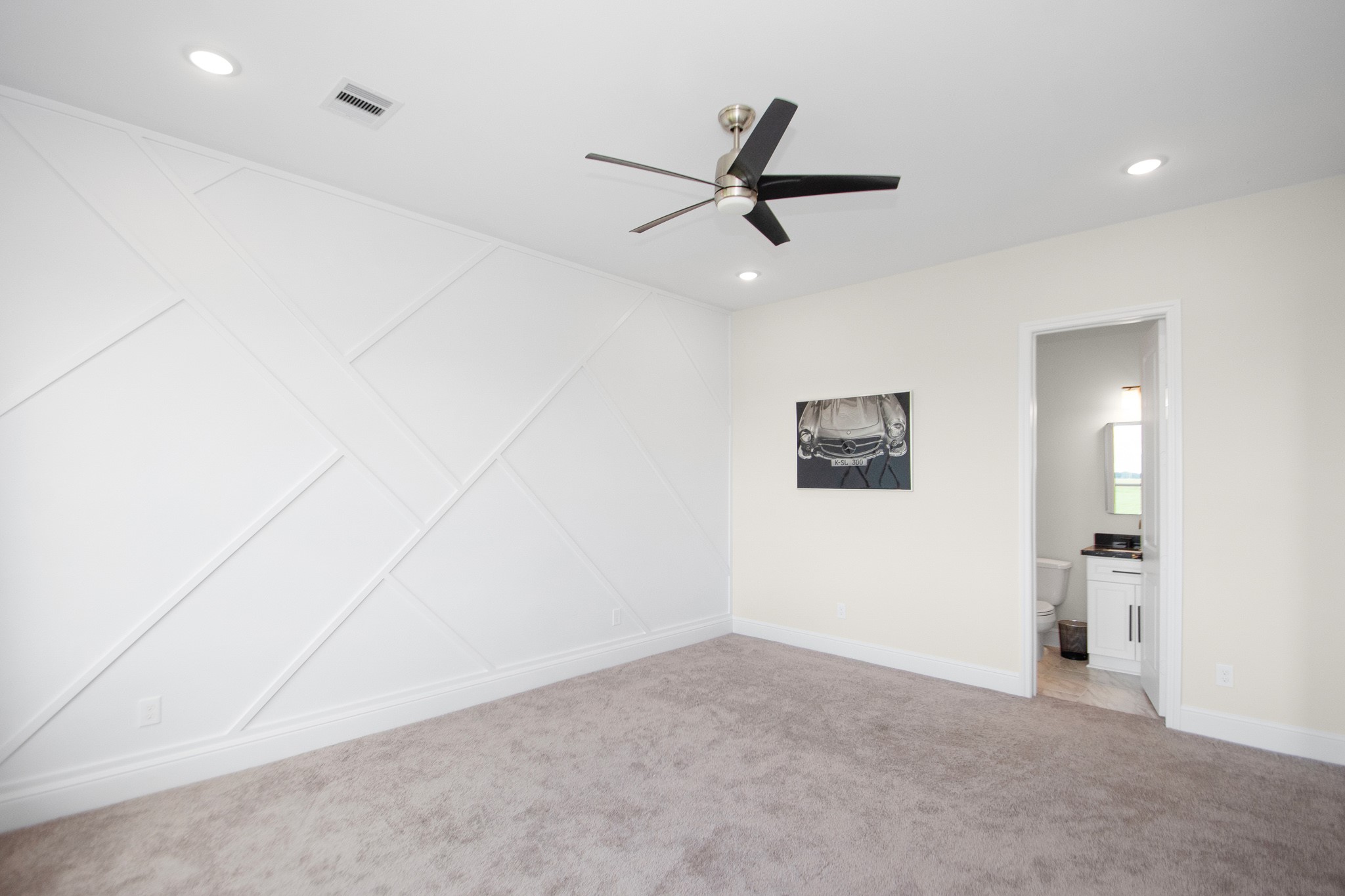 281 Brahman Trail Angleton, TX 77515 - Photo 32 of 43 an empty room with a ceiling fan and window