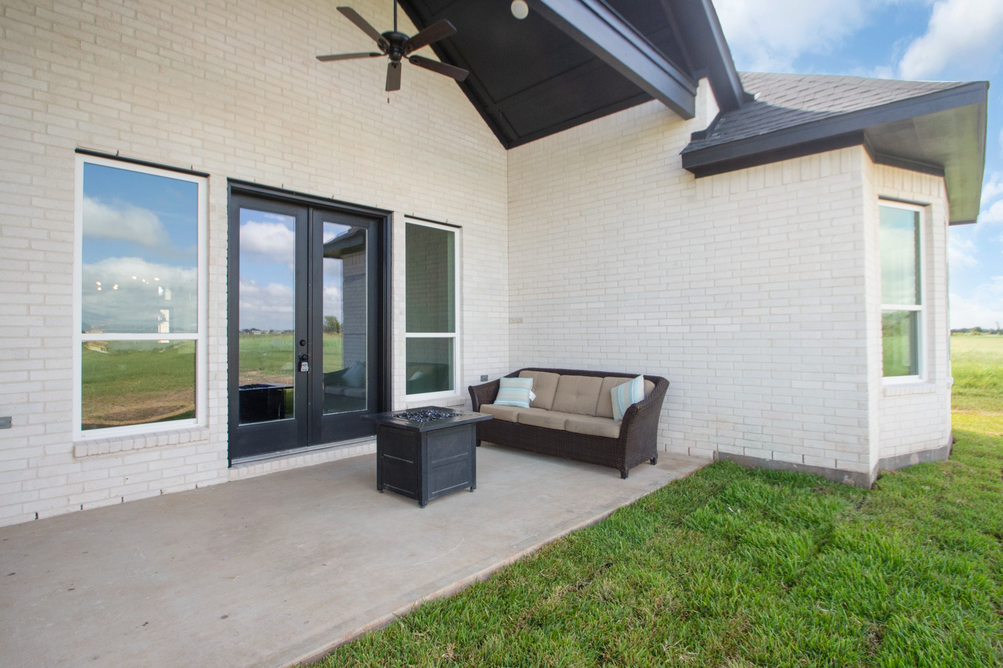 281 Brahman Trail Angleton, TX 77515 - Photo 5 of 43 a view of a patio with couches chairs and potted plants