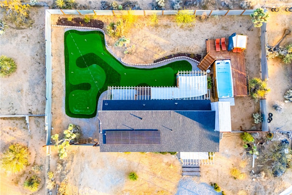 60423 La Mirada Trail Joshua Tree, CA 92252 - Photo 2 of 29 swimming pool view with a garden and bathtub