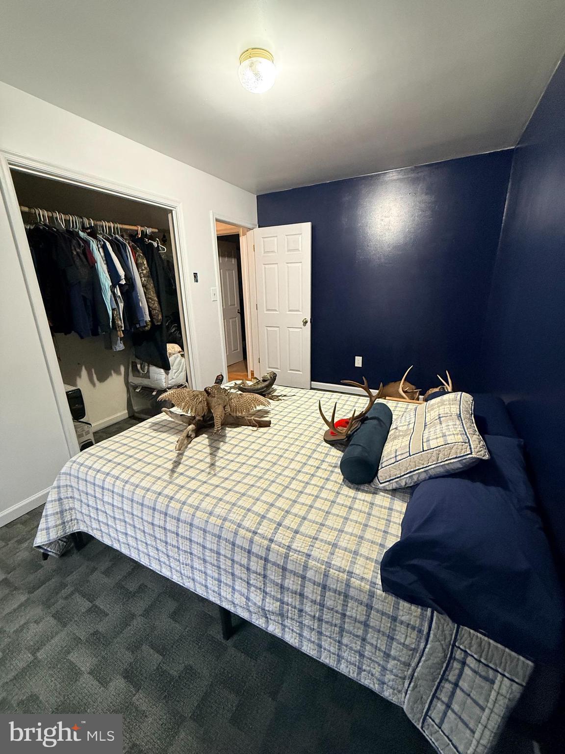 319 Canal Road Falling Waters, WV 25419 - Photo 16 of 29 a bedroom with double bed and a window