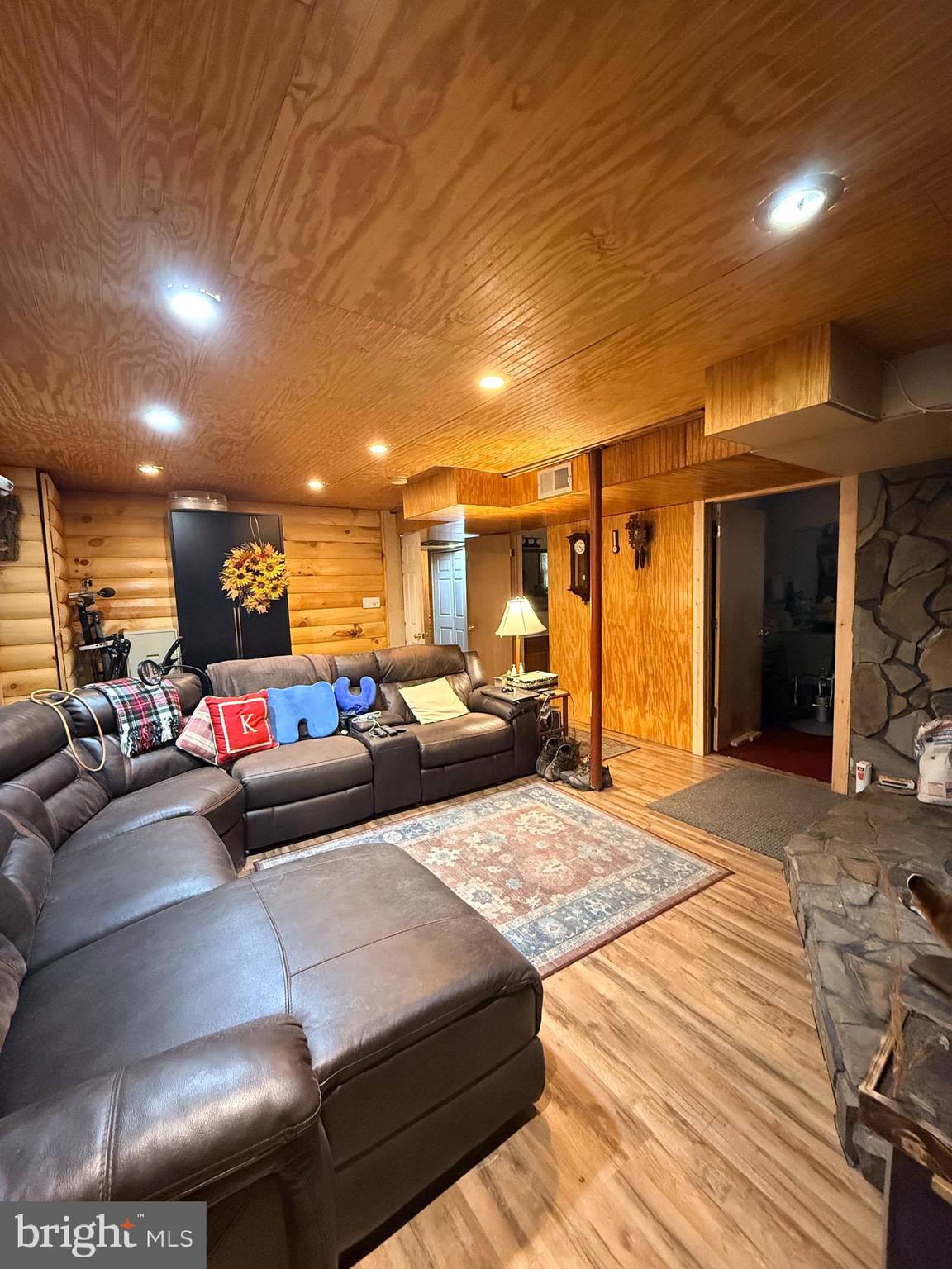 319 Canal Road Falling Waters, WV 25419 - Photo 21 of 29 a living room with furniture and a table