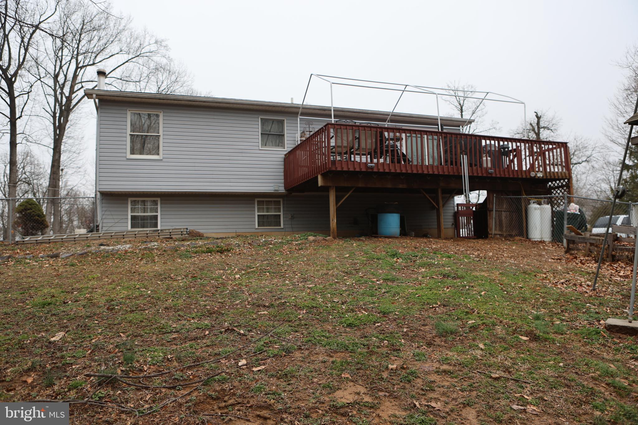 319 Canal Road Falling Waters, WV 25419 - Photo 23 of 29 a front view of a house with parking space