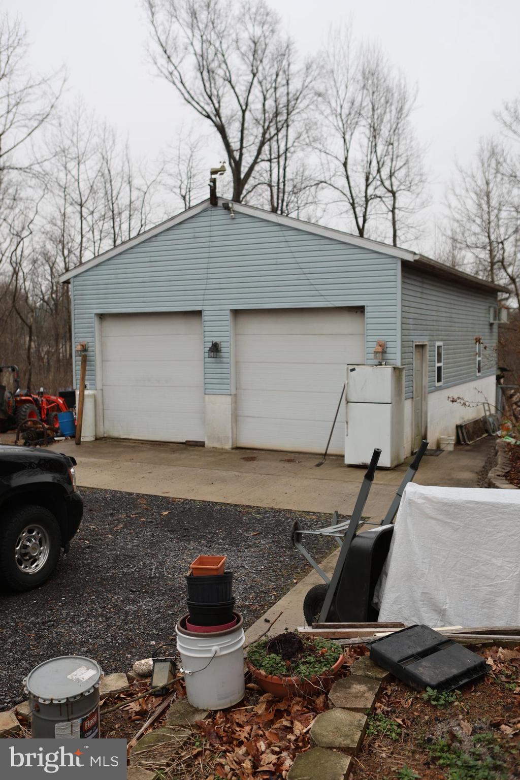 319 Canal Road Falling Waters, WV 25419 - Photo 27 of 29 a house view with a backyard space