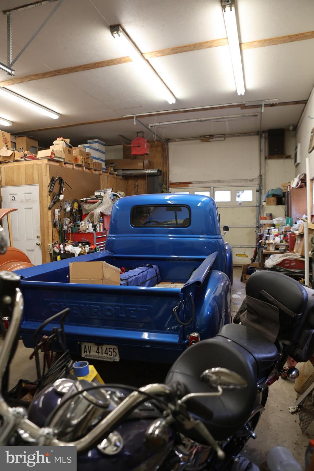 319 Canal Road Falling Waters, WV 25419 - Photo 28 of 29 a room with lots of furniture and clutter
