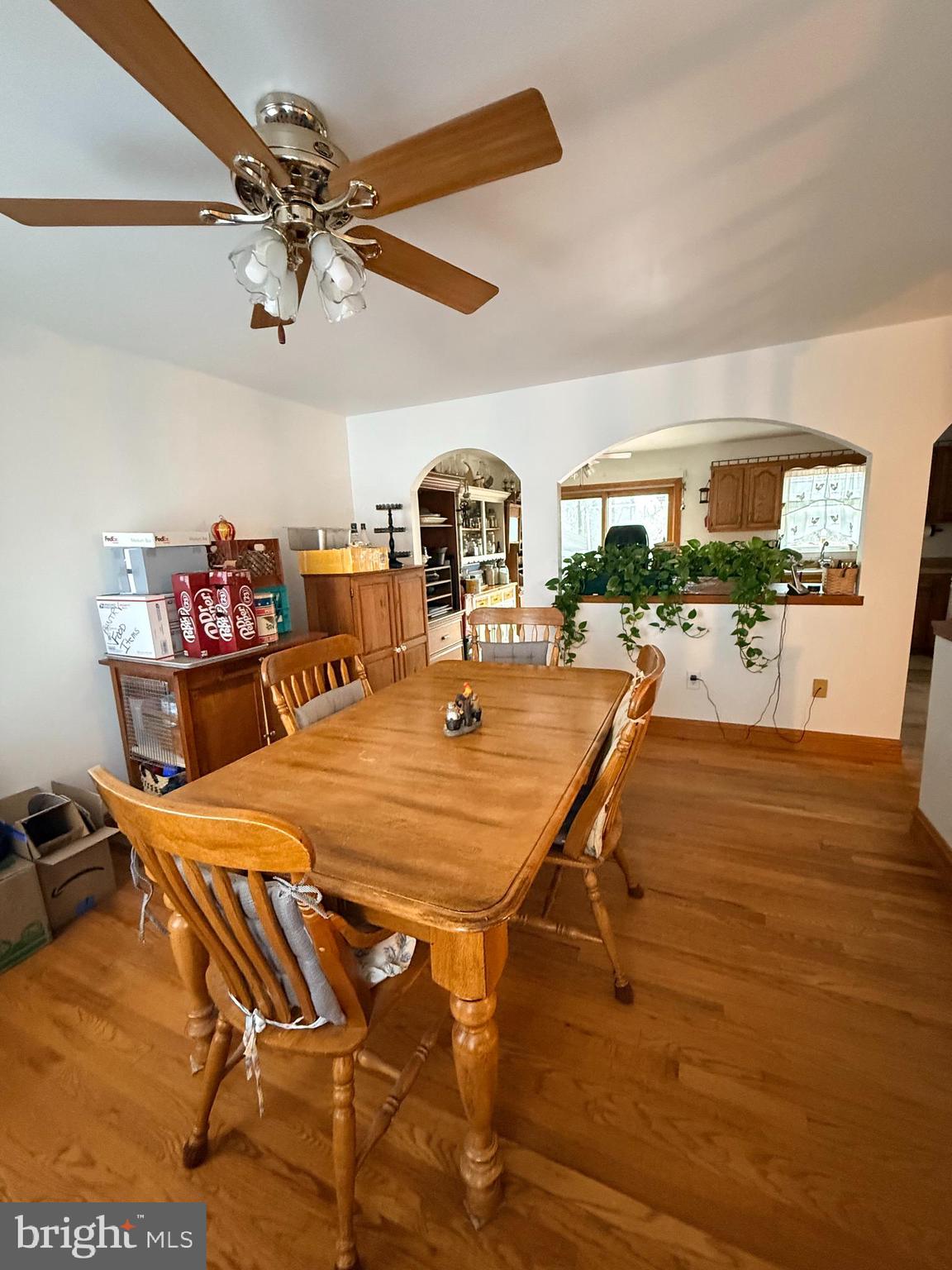 319 Canal Road Falling Waters, WV 25419 - Photo 6 of 29 a dining room with a table and chairs