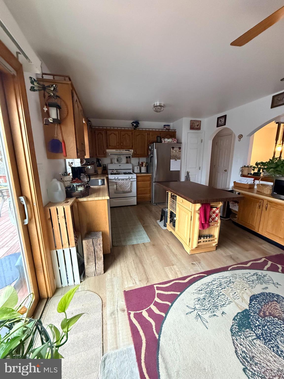 319 Canal Road Falling Waters, WV 25419 - Photo 8 of 29 a living room with furniture fireplace and flat screen tv