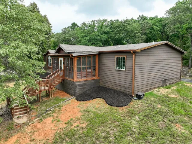 a view of a backyard with a garden