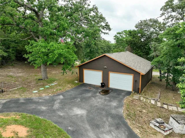 a house with trees in the background