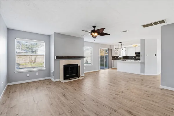 a view of a kitchen with a sink a kitchen and a window