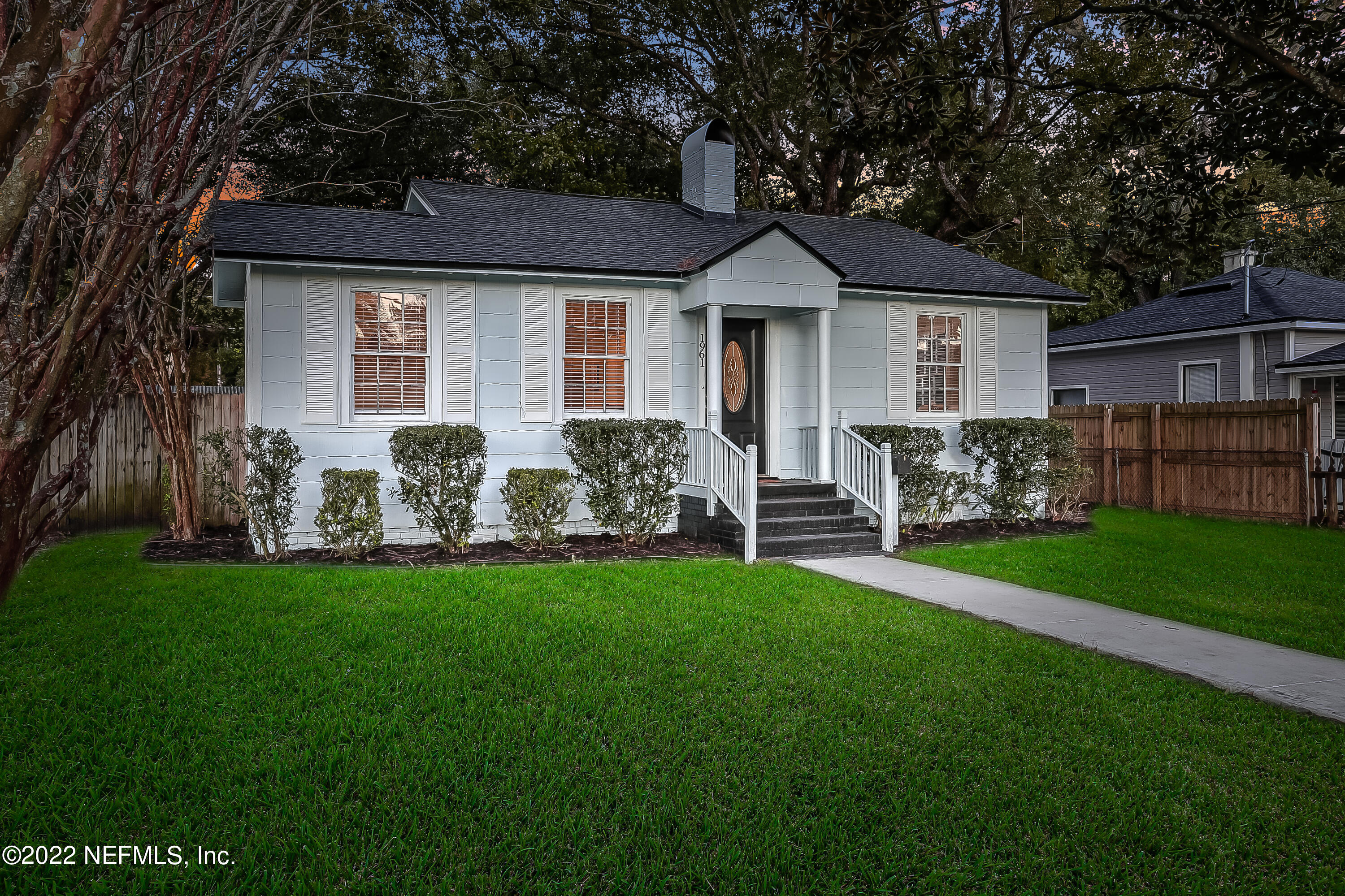 1961 Huntsford Road Jacksonville, FL 32207 - Photo 1 of 30 a front view of house with yard and outdoor seating