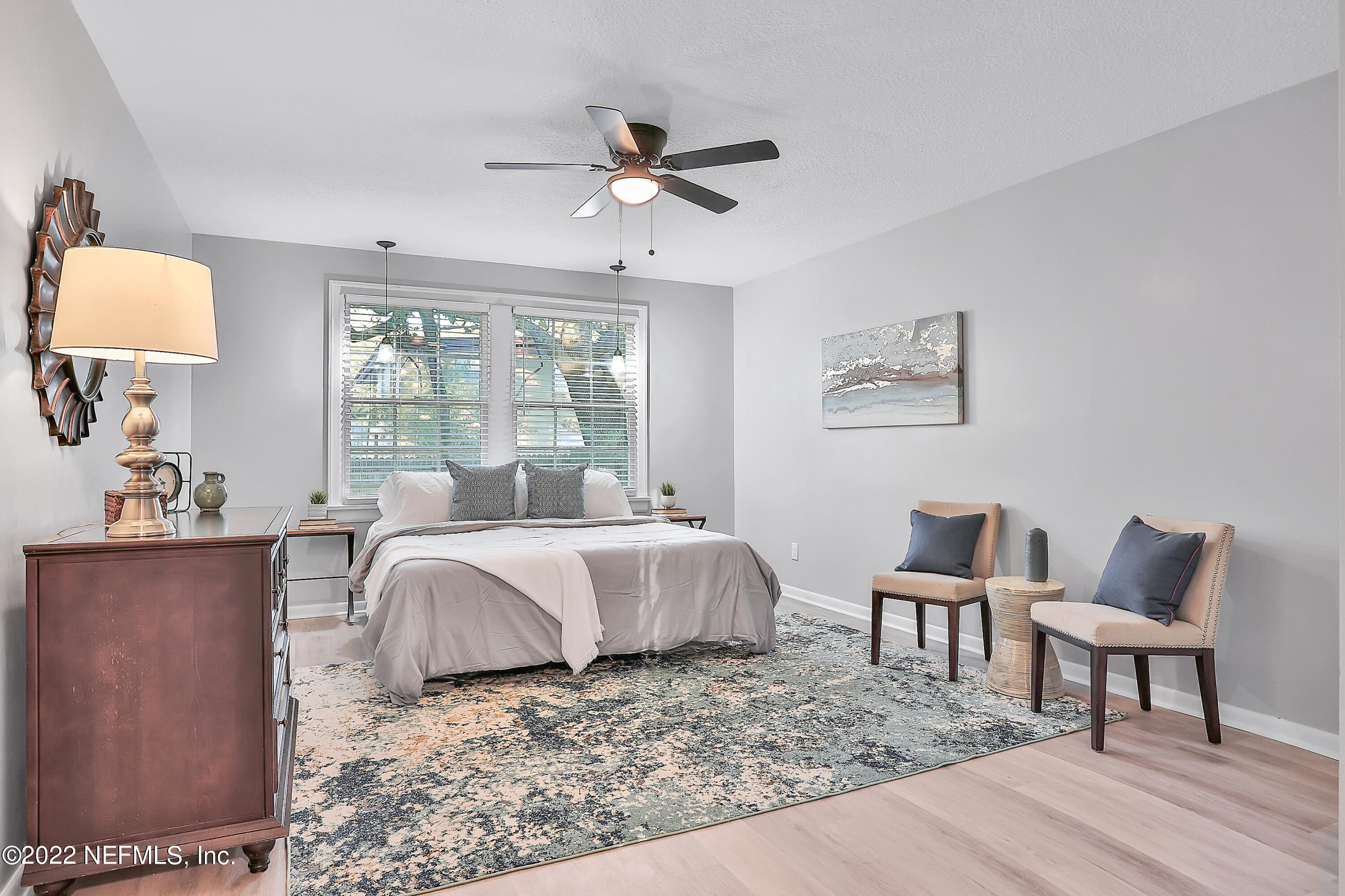 1961 Huntsford Road Jacksonville, FL 32207 - Photo 12 of 30 a bed room with a bed and a couch