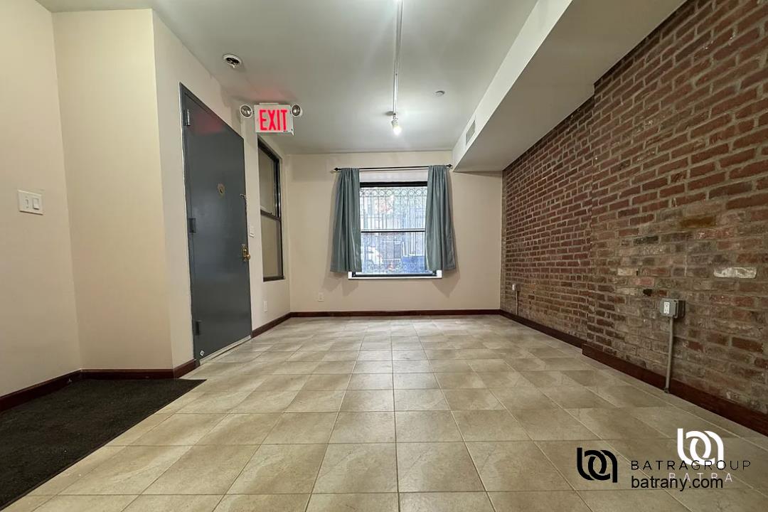 6 East 126th Street, Unit 1 Manhattan, NY 10035 - Photo 6 of 18 a view of an empty room