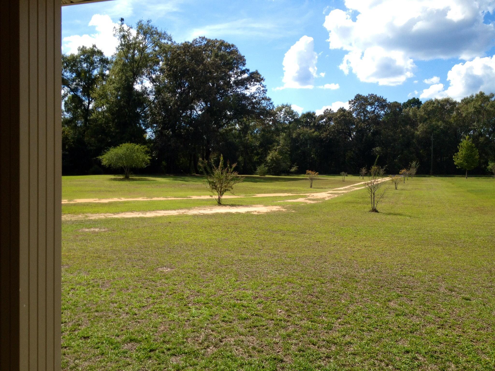 6589 Old River Road, Unit 3 ACRES Baker, FL 32531 - Photo 29 of 30 a view of an ocean and beach