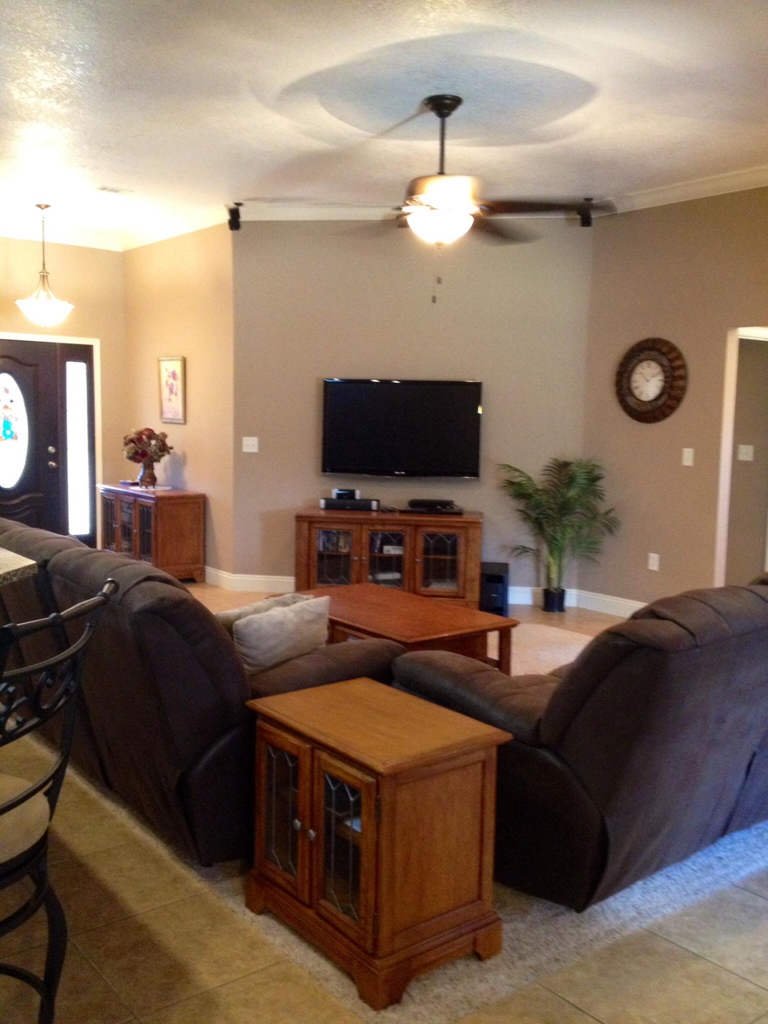 6589 Old River Road, Unit 3 ACRES Baker, FL 32531 - Photo 6 of 30 a living room with furniture and a flat screen tv